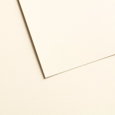 Two overlapping cream-colored sheets of paper with subtle shadows on a pale background (abstract background).