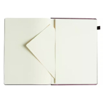 Open notebook with blank cream pages; a triangular folded page sits in the center of the open spread.