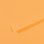 Close-up of orange textured paper with a folded edge and subtle shadows.