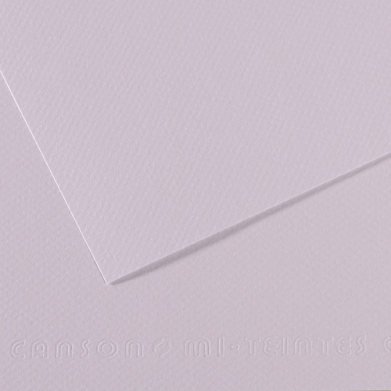 Close-up of lavender textured paper with two overlapping sheets forming a diagonal edge; embossed text along the bottom edge reading Canon.