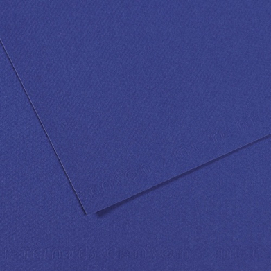 Two overlapping royal blue sheets of textured paper on a matching blue background.
