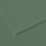 Close-up of green textured material with a diagonal seam and overlapping corner, like leather or heavy paper texture used as a background.