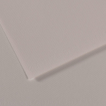 Close-up of pale pink textured paper with a subtle crosshatch pattern and a diagonal corner edge visible.