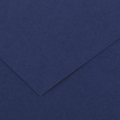 Close-up of navy blue paper with a diagonal fold creating an overlapping corner shape, like a folded card edge.