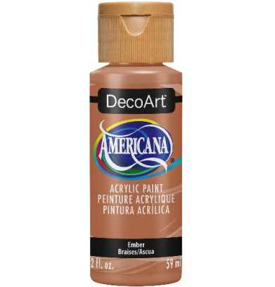 DecoArt Americana acrylic paint bottle in Ember color, 2 fl oz (59 ml), label visible on brown bottle.